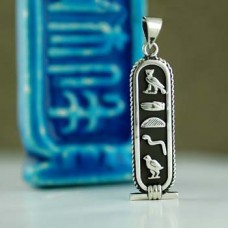 Silver Cartouche with filigree border and dark background   